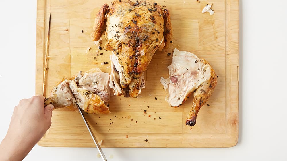 Pull the thigh away from the drumstick and cut through the joint to separate. 