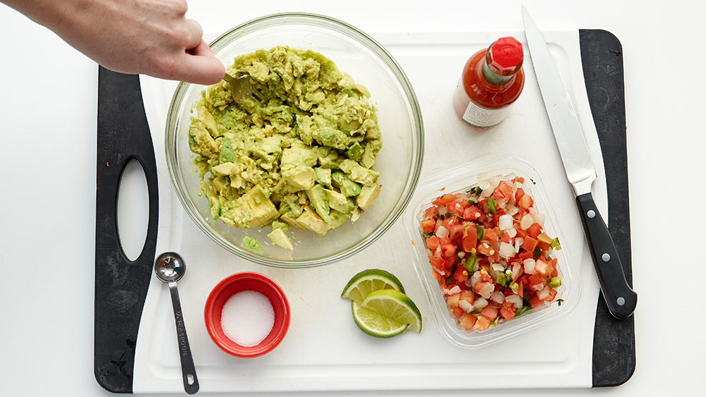 Mash chopped avocados