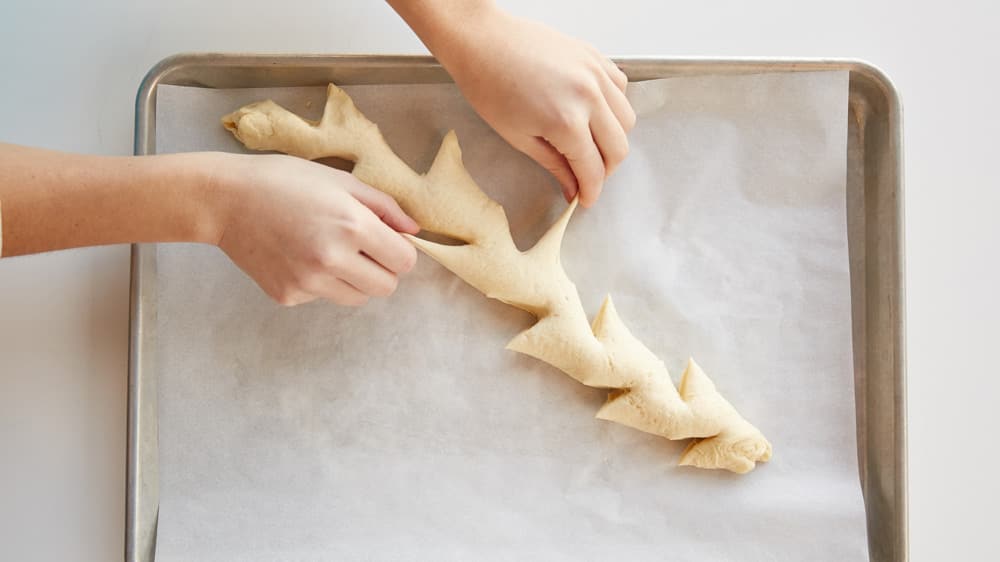 Pull apart crescent dough at spot where you cut