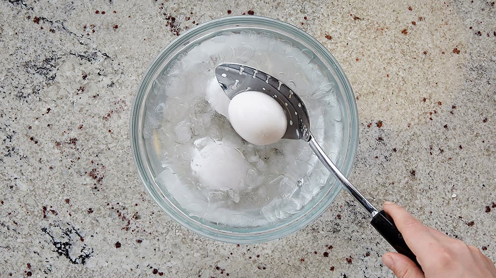 Submerge eggs in an ice bath