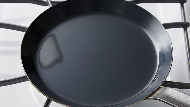 Heat your crepe pan over medium-high heat until hot. Grease the pan lightly with oil