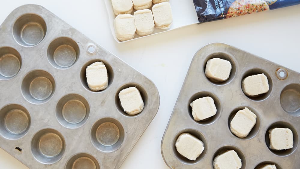 Cookie dough in mini muffin tins