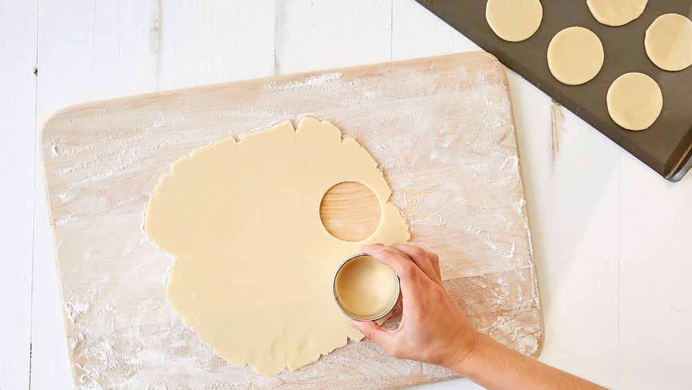 Roll out dough to 1/8 in thickness, cut with cookie cutter