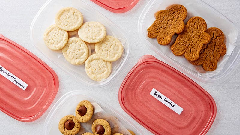 Labeled plastic containers with cookies