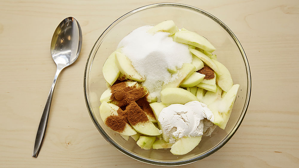 Peeled, sliced apples, flour, sugar, cinnamon, nutmeg, salt