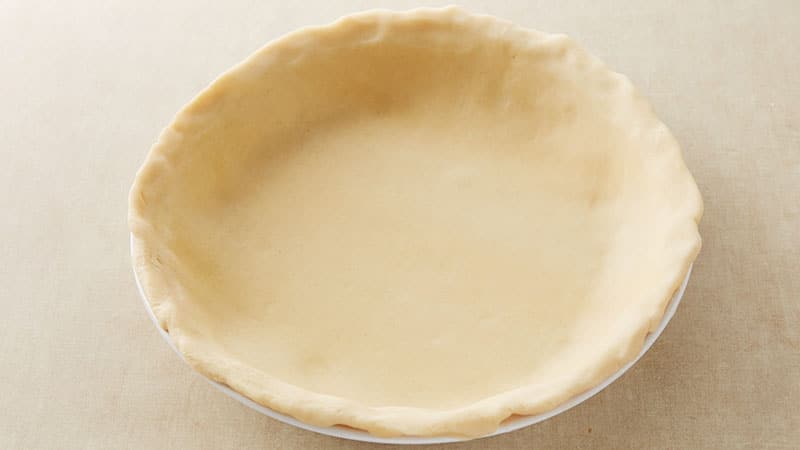 Pie dough in a pie pan