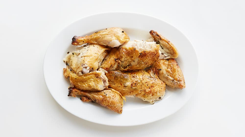 Arrange chicken pieces on a serving platter. 