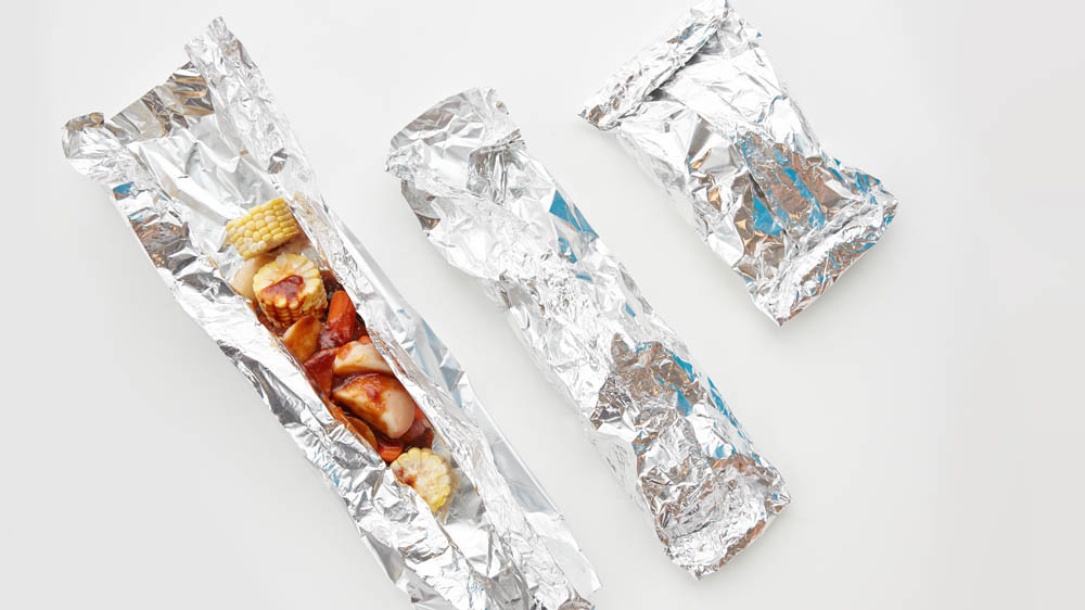 Wrap pork chops and veggies in foil