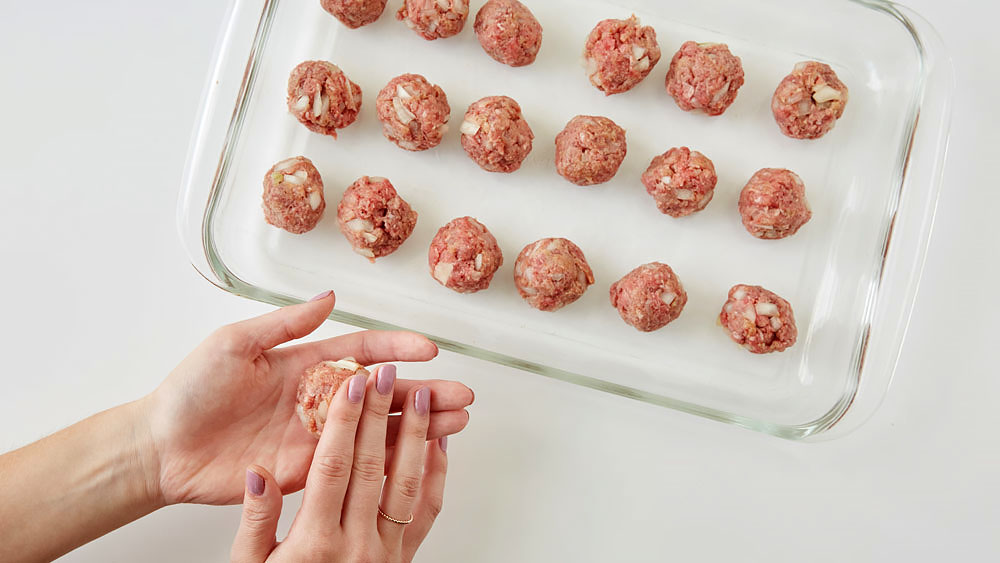 Form meatballs and place them in a glass baking dish