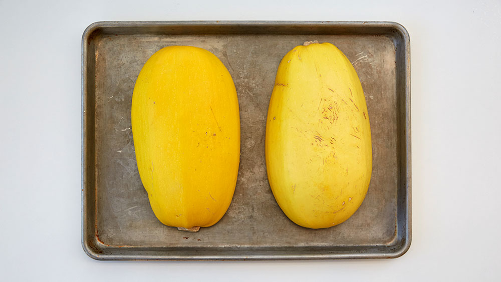 Place the squash halves cut-side-down in an ungreased 3-quart baking dish.