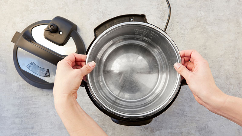 Place the pot inside of the heating element 