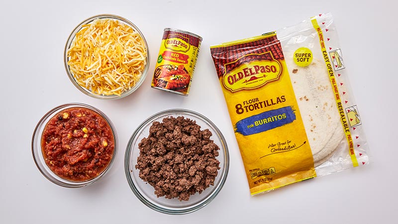 Browned ground beef, package of Old El Paso tortillas, shredded cheese, 1 can of Old El Paso enchilada sauce, salsa