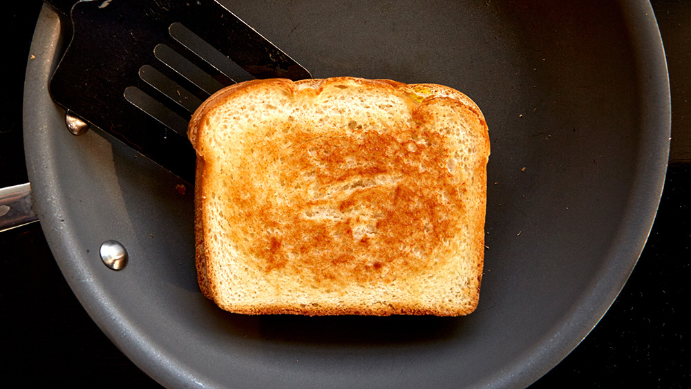 Heat your skillet or griddle over medium heat until hot. Place the sandwich in the skillet and cook for about two minutes, or until golden brown