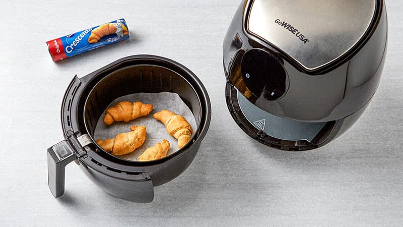 Crescent rolls in an air fryer after cooking