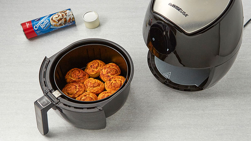 Cinnamon rolls in an air fryer after cooking