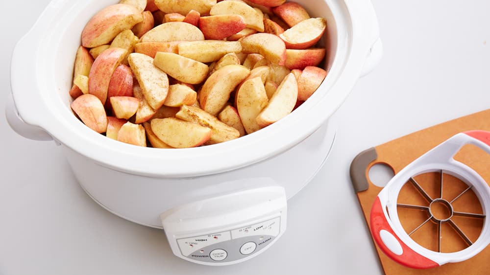 Chopped apples in a slow cooker