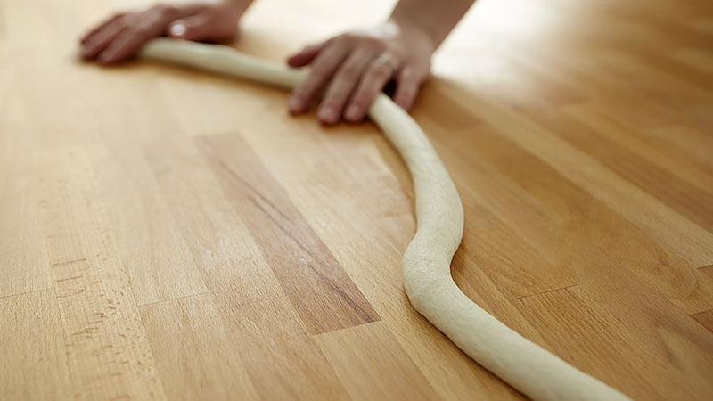 Roll the dough into a long rope.