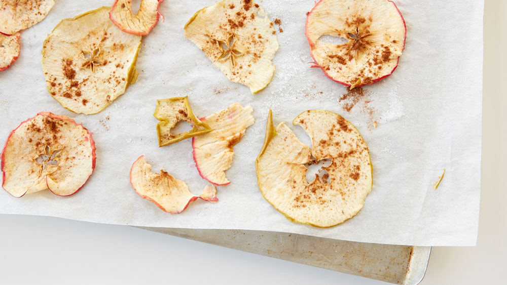 Baked sliced apples topped with cinnamon and sugar