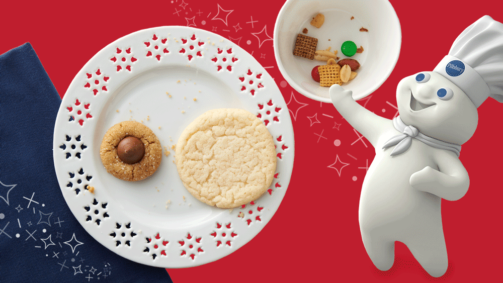 A plate of Christmas cookies and the Pillsbury Doughboy
