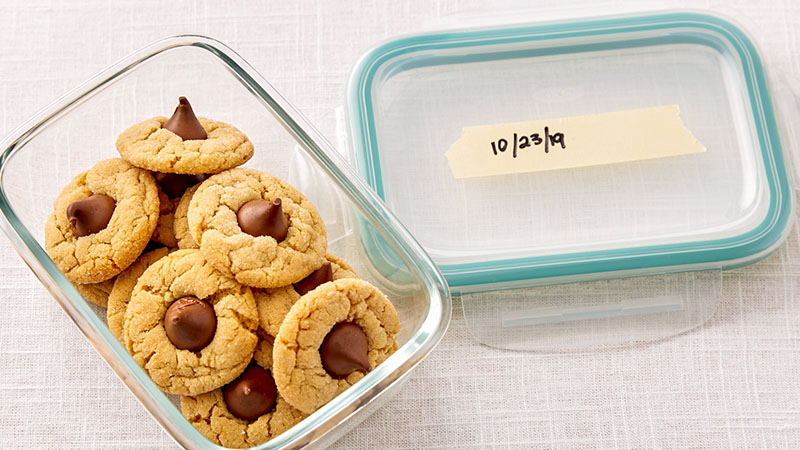 Peanut butter blossoms in a glass container