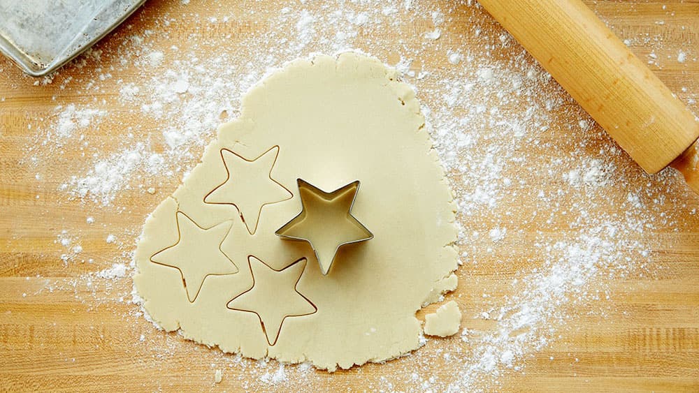 Cookie dough cut into star shapes