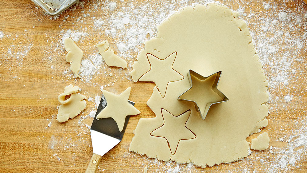 Lift cookies off of cutting board with a spatula