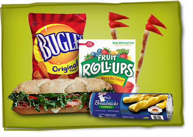 Bag of bugles, box of fruit roll-ups, a sub sandwich and a roll of breadsticks