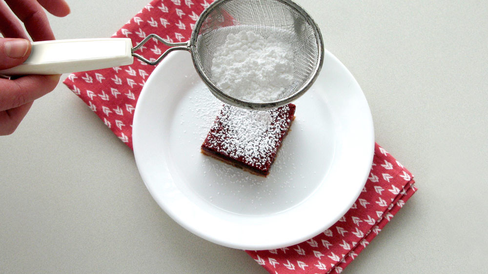 Dust with powdered sugar from a mesh sieve.