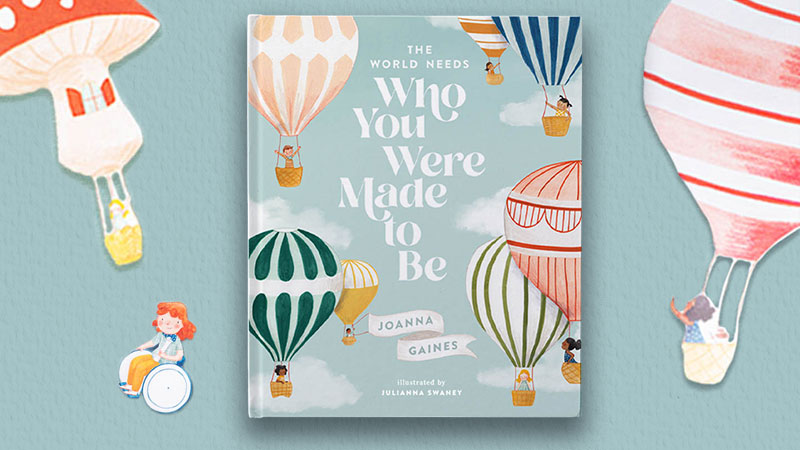 “The World Needs Who You Were Meant to Be,” by Joanna Gaines book cover and paper cutouts of hot air balloons.